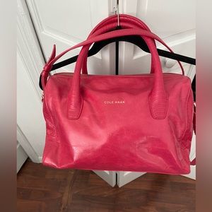 Cole Haan pinkish/red super soft leather handbag with embossed design.